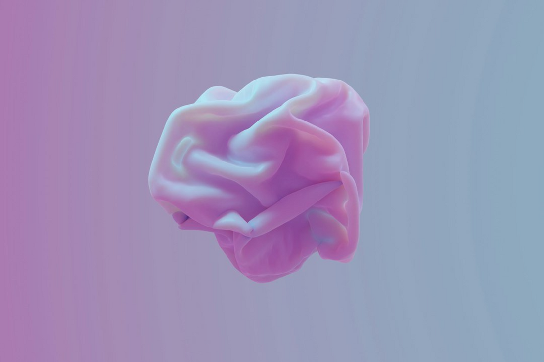 Gradiant image from hot pink to green with an abstract image of a stomach floating in the center. 